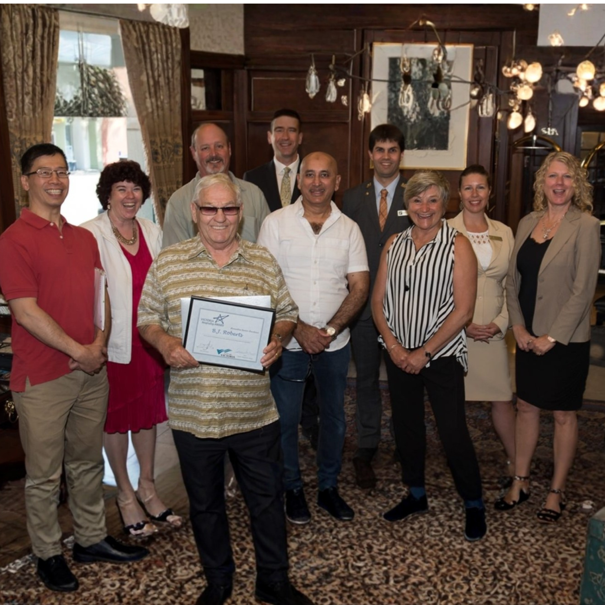 Victoria Taxi driver receiving Victoria Hospitality Award